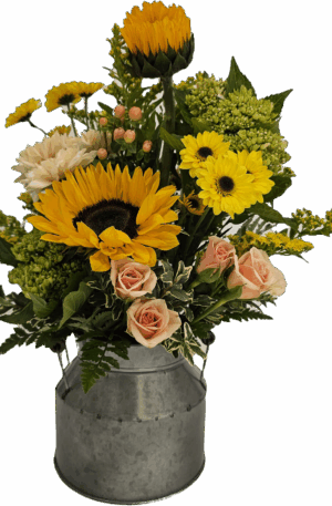Bouquet of fresh flowers arranged in a 1/2 milk can