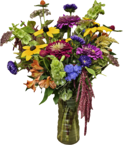 Photo of mixed flowers in a vase.