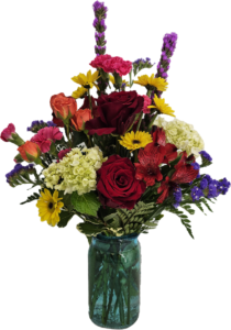a bright and cheery bouquet in a colorful vase