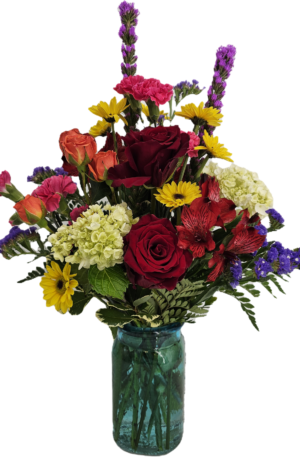 a bright and cheery bouquet in a colorful vase